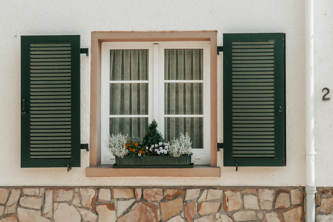How Wooden Window Shutters Can Enhance Home Value and Appeal