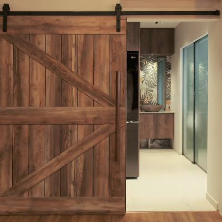 Enhance your farmhouse style with a barnwood sliding door
