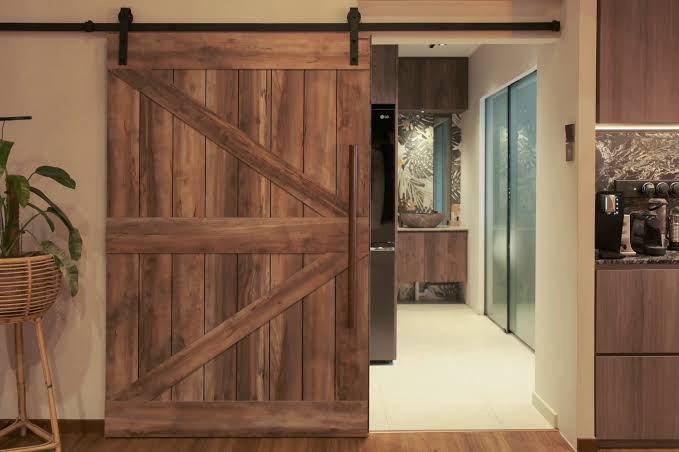 Enhance your farmhouse style with a barnwood sliding door