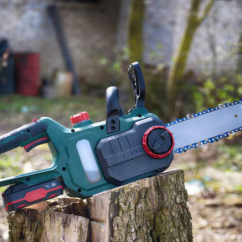 Which chainsaw is best for cutting hardwood and large logs on rural properties?