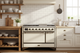 ILVE Majestic III 48" Dual Fuel, Range, Antique White, Burnished Trim UM48FQNR3AWB