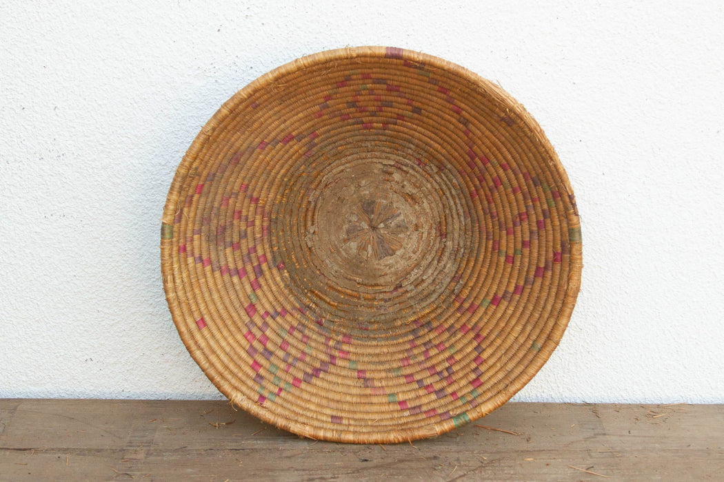 Vintage Woven Basket with Geometric Pattern