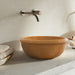 gobek natural golden sienna natural stone vessel sink honed and filled SKU KMRC166DI Size (D)16" (H)6" installed on bathroom as mounting type is countertop