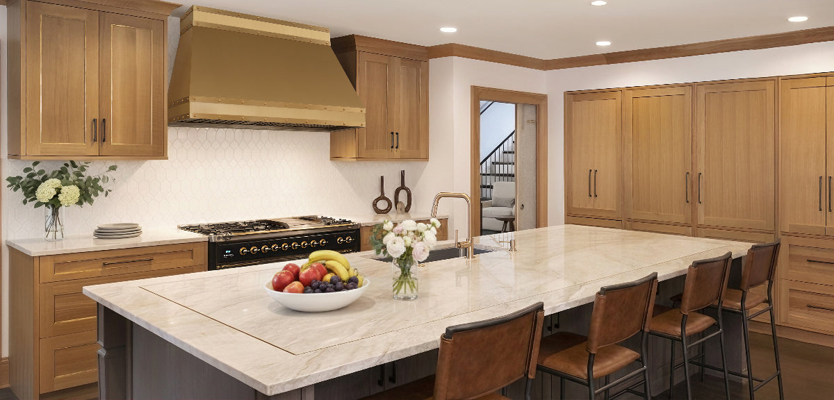 Angled Custom Brass Range Hood with Brass Apron