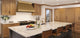 Angled Custom Brass Range Hood with Brass Apron