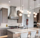 Curved Stainless Steel Custom Range Hood with Crown and Clipped Corners