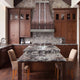 Hammered Copper Range Hood with Stainless Steel Straps and Rivets