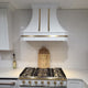 Sweep White Stainless Steel Custom Range Hood with Brass Bands