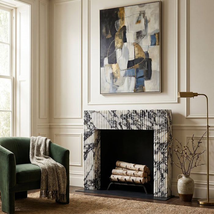 Living room with a fireplace, abstract painting, and green armchair. Calacatta Viola Marble Fluted Fireplace Mantel Polished (L)36" (H)40" (D)2.5"