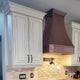 Curved Vintage Copper Kitchen Hood with Hammered Apron