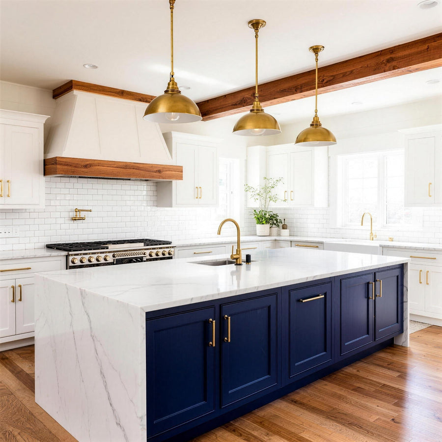 Modern farmhouse kitchen with navy island and marble waterfall