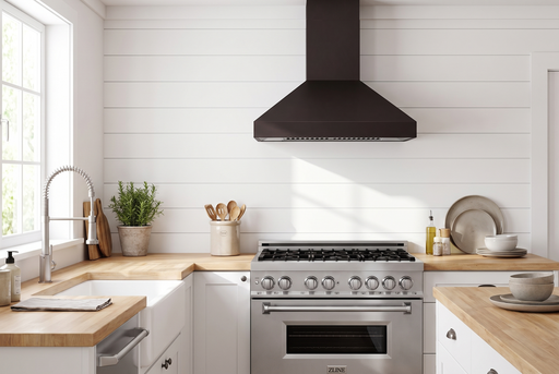 ZLINE 36-inch bronze statement kitchen set staged: RA36 stainless range, 8667B-36 oil-rubbed bronze wall hood, Apollo faucet