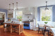 Kitchen island with swing arm seating - Custom reclaimed wood kitchen island - Modern Farmhouse Kitchen Island with swing out tractor seats