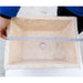 troia light beige rustic natural stone Vessel Sink honed and hand chiseled size W12 L17 H6 SKU NTRSTC54 length view