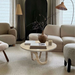 Troia Light Travertine Vein-cut Designer Round Polished Coffee Table (D)24" (H)14" living room beige couch and beige carpet