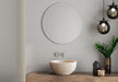 Troia Light Travertine Round Above Vanity Bathroom Sink Honed (D)12.5" (H)6" installed above wooden vanity with a chrome faucet and soap dispenser